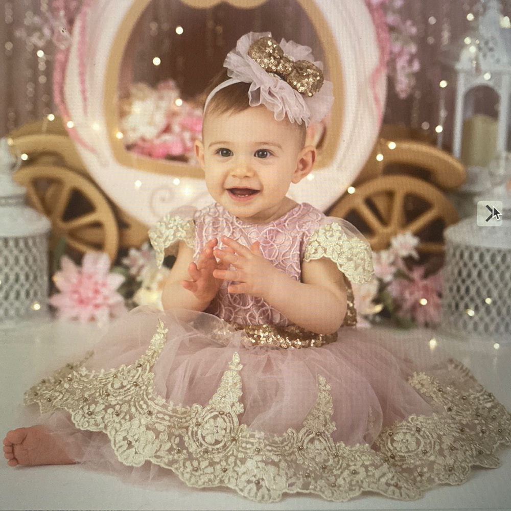 Gorgeous first birthday party dress and matching headband for a baby girl.